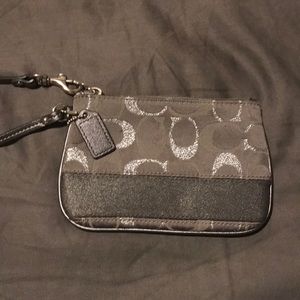 Silver and greyCoach Wristlet